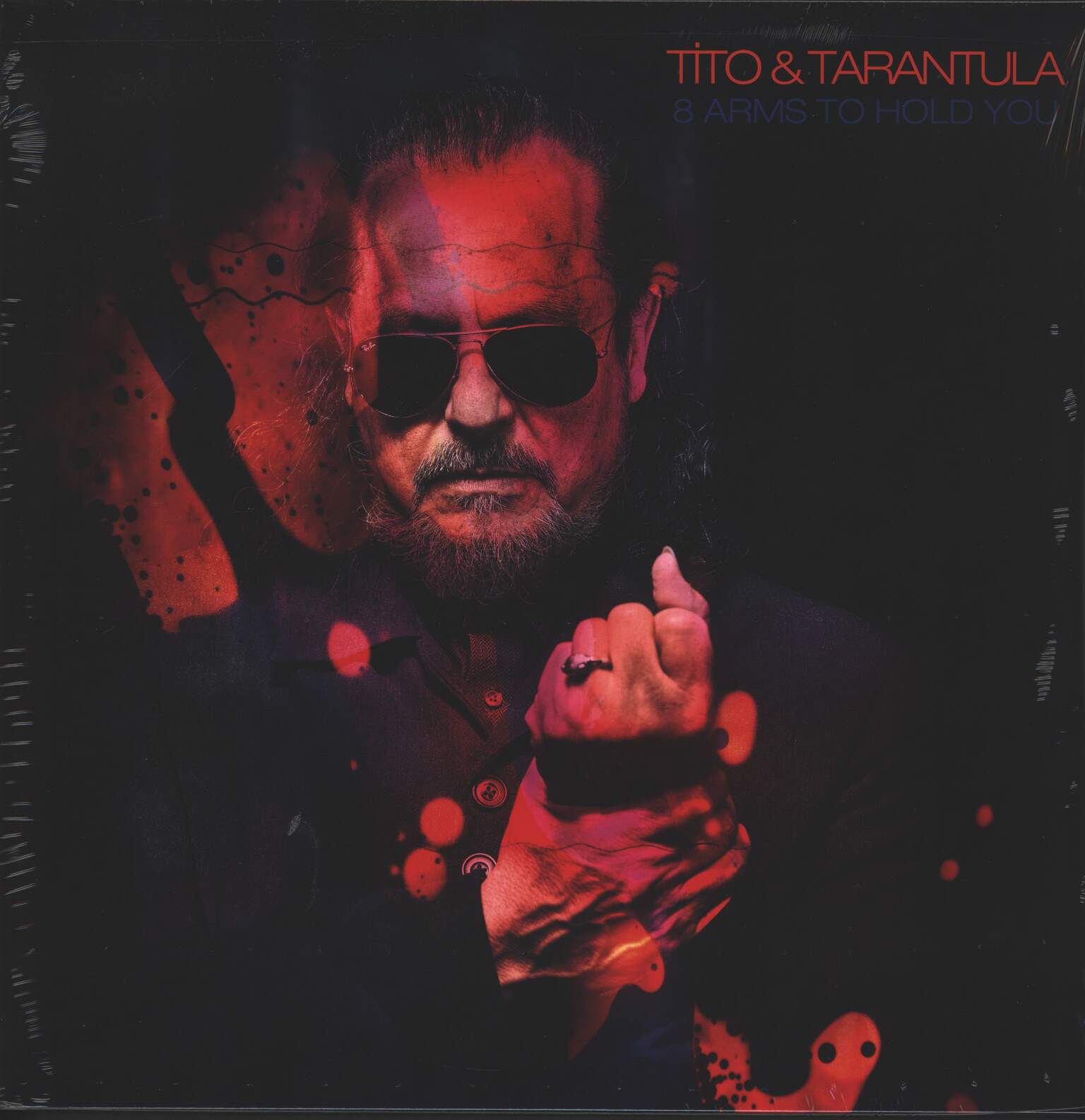 Tito & Tarantula: 8 Arms To Hold You