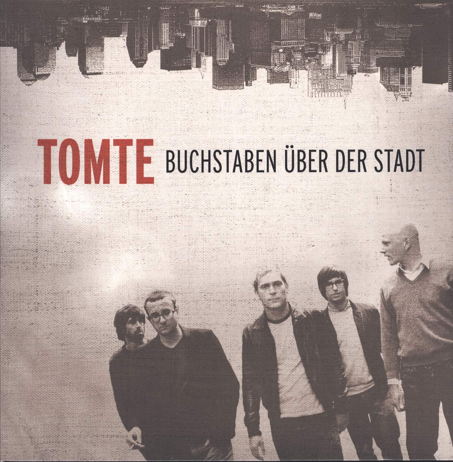 Tomte: Buchstaben Über Der Stadt