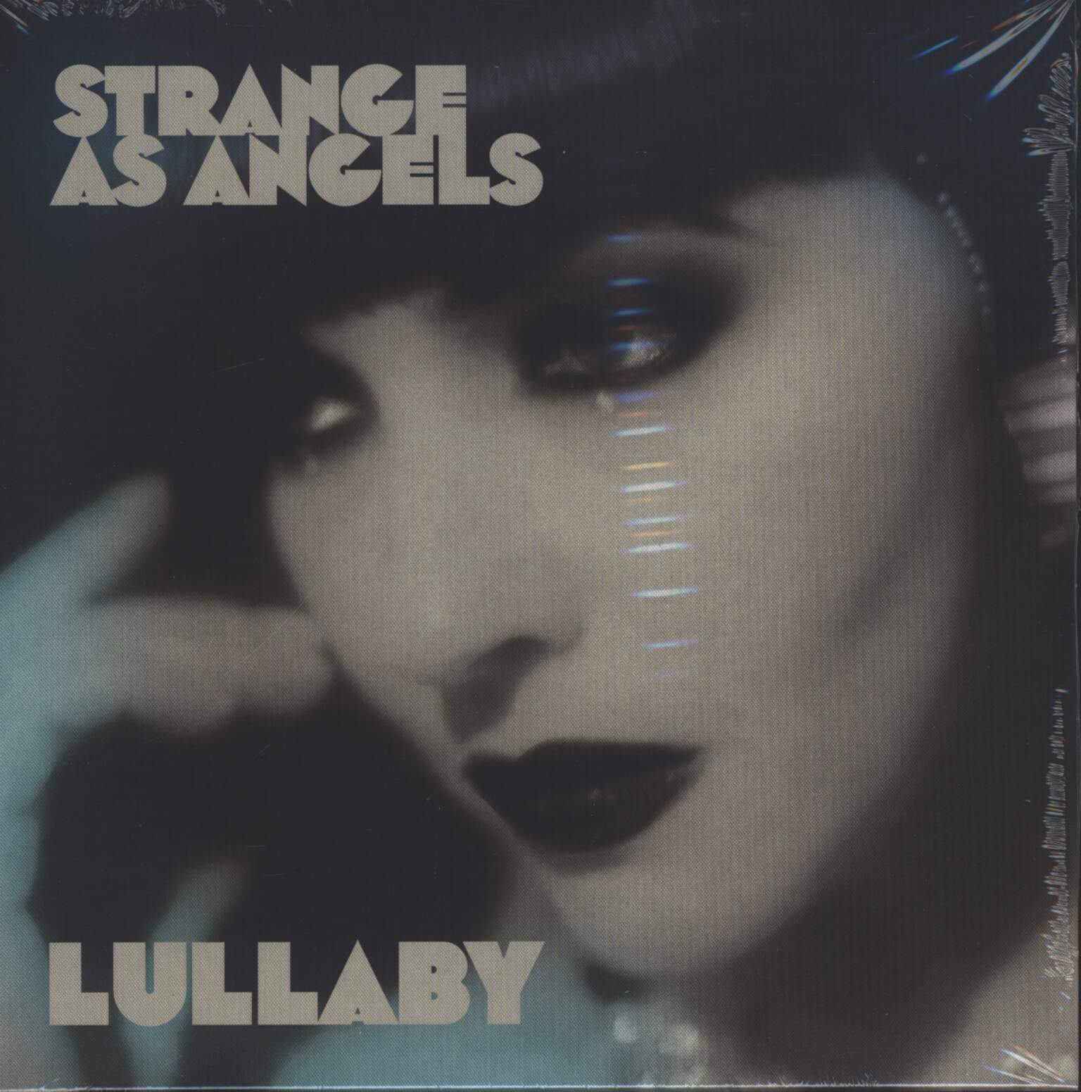 Strange As Angels: Lullaby / Dressing Up